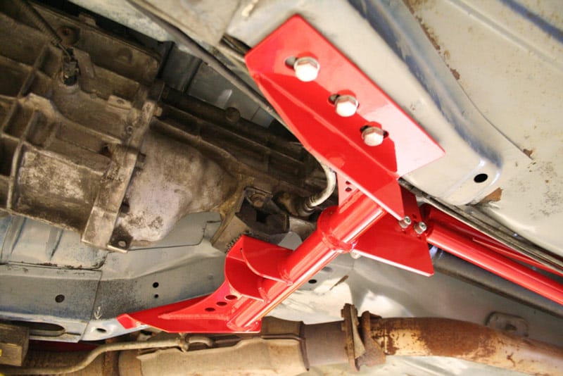 1982-1992 F-Body Torque Arm Relocation Crossmember Kit by UMI Performance, 700R4/T5 - 2228
