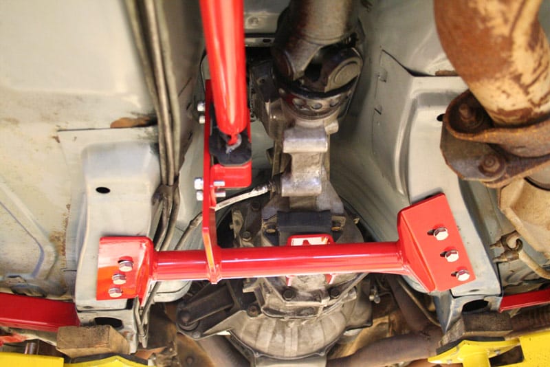 1982-1992 F-Body Torque Arm Relocation Crossmember Kit by UMI Performance, 700R4/T5 - 2228