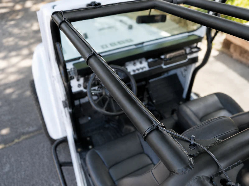 Clean cable and wire management inside an off-road vehicle using Flexroute rubber line clamps.
